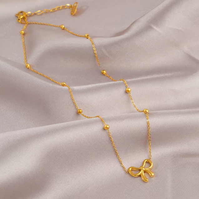 Collier Nœud de Papillon Doré