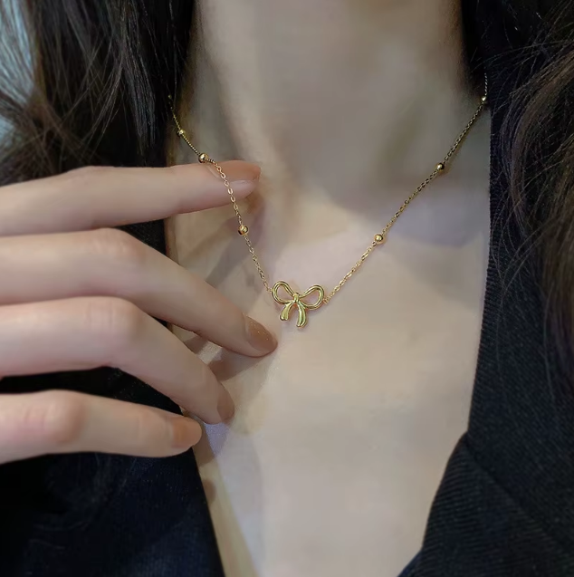 Collier Nœud de Papillon Doré